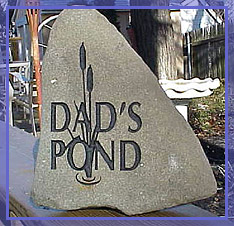 engraved stock river stone dad's pond